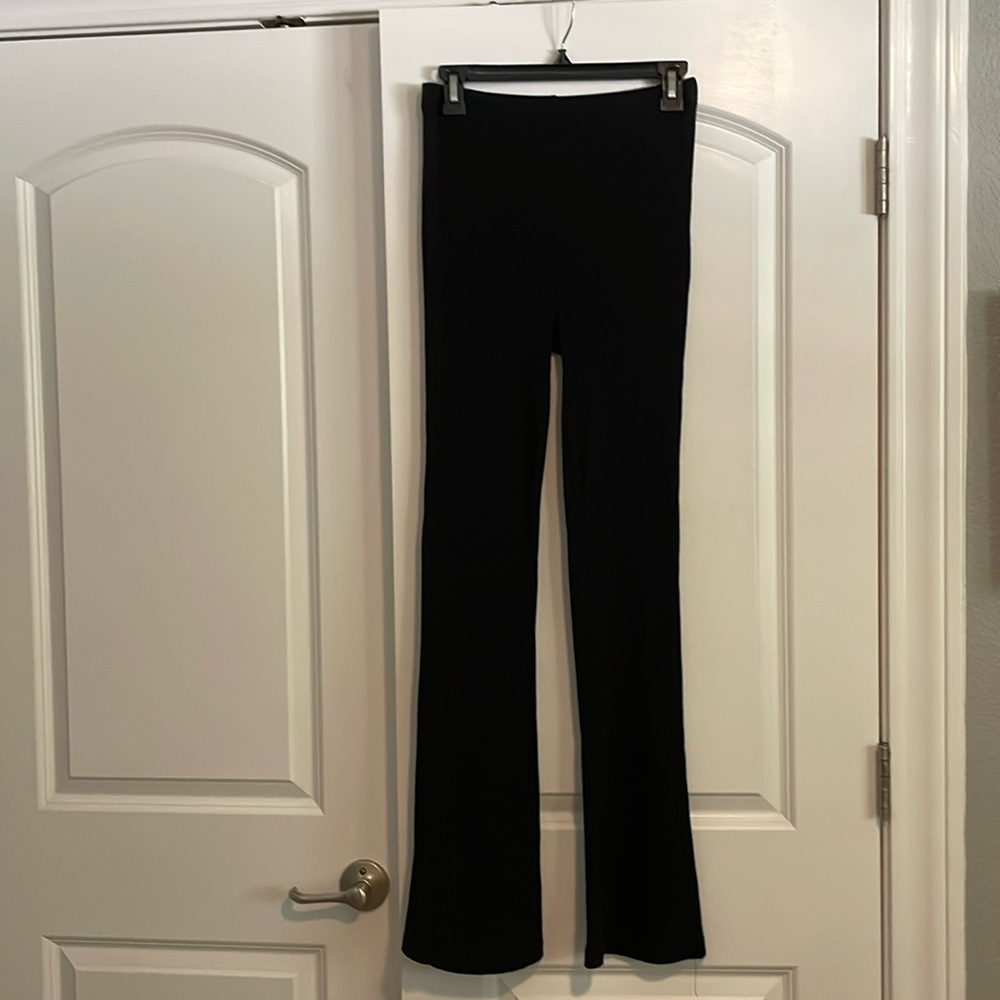 Bundle Of 4 Stretchy Flared Pants Size Small - image 1